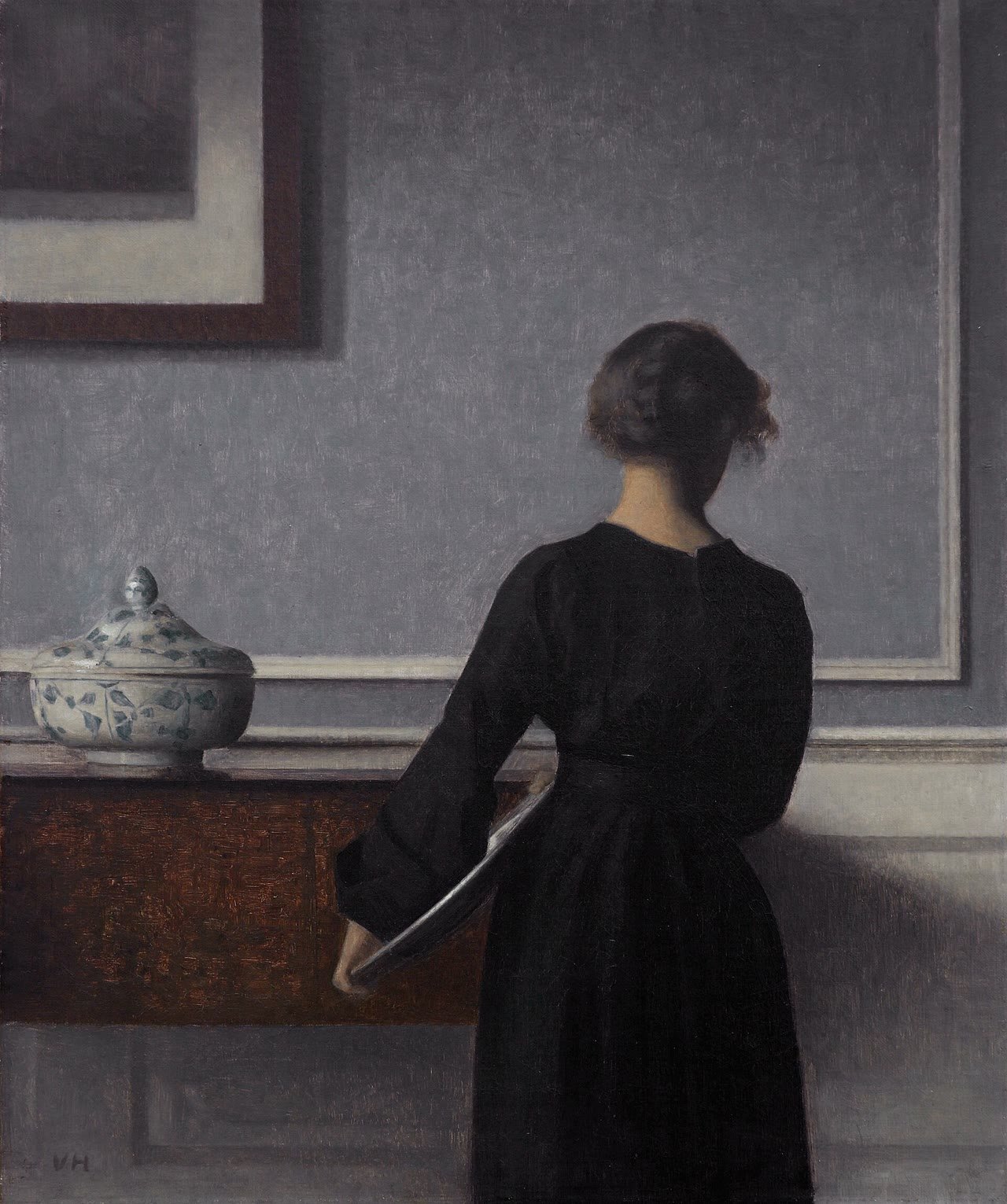 Interior com uma mulher vista de costas, de Vilhelm Hammershøi